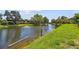 The pond features a fountain and a tranquil setting within the Village Lake Condominiums community at 880 S Village Lake N Dr # 106, St Petersburg, FL 33716