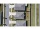 Aerial view of roofs and fenced backyards in a residential neighborhood at 11210 Kelly Green Ave, Wimauma, FL 33598
