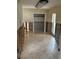 Partially renovated room featuring neutral tones and a window at 2450 Roberta Ln, Clearwater, FL 33764