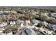 An aerial shot showcasing the home's location in a desirable neighborhood with mature trees and landscaping at 4251 Whittner Dr, Land O Lakes, FL 34639