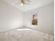 Bright bedroom with neutral carpet and large window providing ample natural light at 4251 Whittner Dr, Land O Lakes, FL 34639