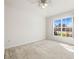 Bedroom featuring plush carpeting and a bright window, creating a serene atmosphere at 4251 Whittner Dr, Land O Lakes, FL 34639