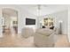 Bright and airy living room with vaulted ceiling, neutral decor, and large window views of backyard at 4251 Whittner Dr, Land O Lakes, FL 34639