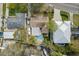 Aerial view of home showing pool, boat parking, and surrounding landscaping at 710 S Davis Blvd, Tampa, FL 33606
