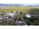 Overhead shot of the property, showcasing the surrounding landscape, nearby airport, and waterfront views at 710 S Davis Blvd, Tampa, FL 33606