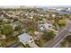 Stunning aerial view of a charming neighborhood with mature trees and Tampa skyline views at 710 S Davis Blvd, Tampa, FL 33606