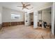 Bright bedroom with closet space and a ceiling fan at 710 S Davis Blvd, Tampa, FL 33606