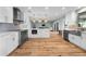 Open kitchen featuring stainless steel appliances, modern cabinets and lighting at 710 S Davis Blvd, Tampa, FL 33606