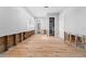 Spacious living room featuring multiple doorways, hardwood floors and great natural light at 710 S Davis Blvd, Tampa, FL 33606