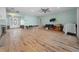 Open-concept living room with hardwood flooring and ample space for entertaining at 710 S Davis Blvd, Tampa, FL 33606
