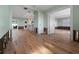 Open living space with hardwood floors, recessed lighting, and a view into the kitchen and additional rooms at 710 S Davis Blvd, Tampa, FL 33606