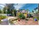 Backyard with wooden deck, mature greenery, a compact AC unit and partial view of the home at 830 S Davis Blvd, Tampa, FL 33606