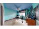 Bright bedroom with a blue ceiling, unique decor and a ceiling fan at 830 S Davis Blvd, Tampa, FL 33606
