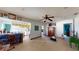 Open living area leading into the kitchen, with decorative elements and potential for customization at 830 S Davis Blvd, Tampa, FL 33606