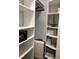 Well-organized closet with custom shelving and space for storage at 1314 Riserva Ln, Palm Harbor, FL 34683