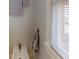 Cozy bathroom featuring a bidet, neutral tones, and a window at 2418 2Nd S Ave, St Petersburg, FL 33712
