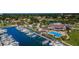 Overhead view of the community showcasing the marina, swimming pool, clubhouse, and golf course, blending luxury and recreation at 2775 Kipps Colony S Dr # 105, Gulfport, FL 33707