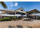 Exterior view of a two-story building with a patio at 2775 Kipps Colony S Dr # 105, Gulfport, FL 33707
