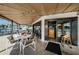 Charming outdoor seating area with views of the marina, providing a relaxing space for dining and socializing at 2775 Kipps Colony S Dr # 105, Gulfport, FL 33707