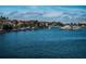 Picturesque waterfront showcasing boats docked in the channel along luxury residential homes at 2775 Kipps Colony S Dr # 105, Gulfport, FL 33707