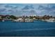 Waterfront view of the channel with an array of boats docked near luxury homes at 2775 Kipps Colony S Dr # 105, Gulfport, FL 33707