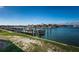 Scenic view of the waterfront with private docks and luxury homes along the canal at 2775 Kipps Colony S Dr # 105, Gulfport, FL 33707