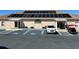 Close up of Grand Horizons community center exterior showing car and golf cart at 37544 Corey Lewis Ave, Zephyrhills, FL 33541