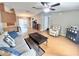 Comfortable living room with tile, hardwood floors and nice furniture at 37544 Corey Lewis Ave, Zephyrhills, FL 33541