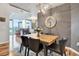 Modern dining room featuring a wooden table and elegant chandelier lighting fixture at 777 N Ashley Dr # 1614, Tampa, FL 33602