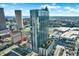 This is an aerial view of a modern high-rise apartment building with stunning city and water views at 777 N Ashley Dr # 1614, Tampa, FL 33602
