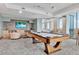 Relaxing game room featuring a pool table, TV, and comfortable seating at 777 N Ashley Dr # 1614, Tampa, FL 33602