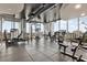 Well-equipped gym with modern fitness equipment and floor to ceiling windows at 777 N Ashley Dr # 1614, Tampa, FL 33602