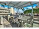 Outdoor kitchen on a roof includes stainless steel grill and ample counter space, with city views at 777 N Ashley Dr # 1614, Tampa, FL 33602