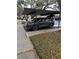 Carport with a dark gray Lincoln SUV parked underneath at 829 3Rd Sw Ave # 2, Largo, FL 33770