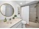 Bathroom featuring a vanity, toilet, tub and shower combination at 9204 Golf View Dr, New Port Richey, FL 34655