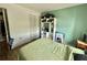 Cozy bedroom with a large bed, ample storage, and bright, inviting colors at 100 Waverly Way # 302, Clearwater, FL 33756