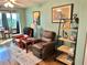 Inviting living room seating area features comfortable recliner chairs and warm natural lighting at 100 Waverly Way # 302, Clearwater, FL 33756