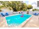 Inviting backyard pool with lounge chairs and stylish decor, perfect for relaxation at 12361 114Th St, Largo, FL 33778