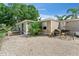 Wide view of backyard with a gravel landscape, patio and lawn at 12526 Spottswood Dr, Riverview, FL 33579