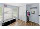 Comfortable bedroom with natural light, a closet, and a storage bench at 12526 Spottswood Dr, Riverview, FL 33579