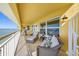 Relaxing balcony with comfortable seating and stunning waterfront views at 370 8Th N Ave # 7, Tierra Verde, FL 33715