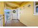 Charming condo entrance with decorative wreath and welcome mat at 370 8Th N Ave # 7, Tierra Verde, FL 33715