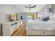 Serene main bedroom featuring ample storage and a balcony with water views at 370 8Th N Ave # 7, Tierra Verde, FL 33715