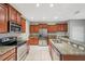 Spacious kitchen with stainless steel appliances and granite countertops at 20209 Merry Oak Ave, Tampa, FL 33647