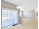 Bright living room with sliding glass doors and tile flooring at 20209 Merry Oak Ave, Tampa, FL 33647