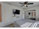 Bright bedroom featuring neutral walls, ample natural light, and a contemporary ceiling fan at 2311 Wellesley, Bradenton, FL 34207