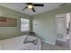 Inviting bedroom featuring neutral walls, ample natural light, and a contemporary ceiling fan at 2311 Wellesley, Bradenton, FL 34207