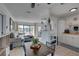 Open-concept layout featuring a spacious living room connected to the kitchen and dining area at 2311 Wellesley, Bradenton, FL 34207