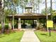 Community pavilion with picnic tables provides a gathering space for residents to relax and socialize outdoors at 4110 Huntingdale Ct, Wesley Chapel, FL 33543