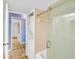 Bathroom with a shower/tub combo and a stackable washer and dryer at 800 S Gulfview Blvd # 403, Clearwater Beach, FL 33767